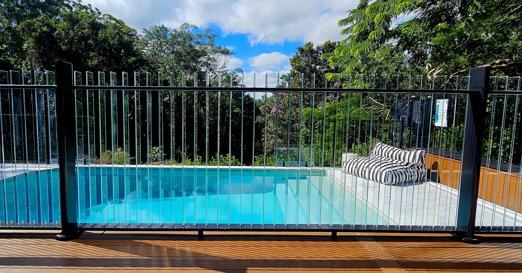 Leafy pool setting · Woombye
